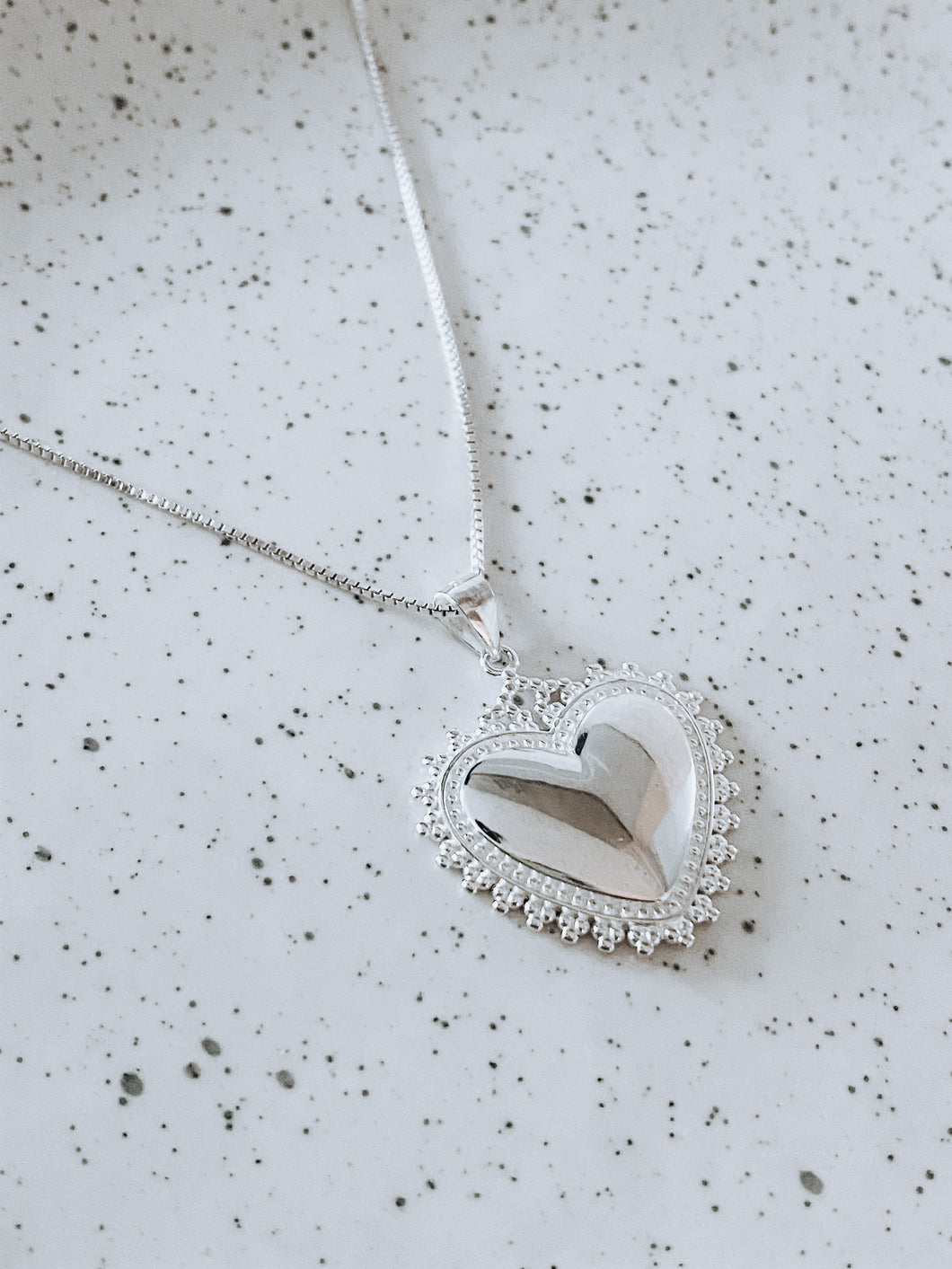 Collar corazón detente